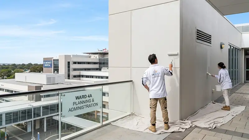 Painting the exterior of a hospital