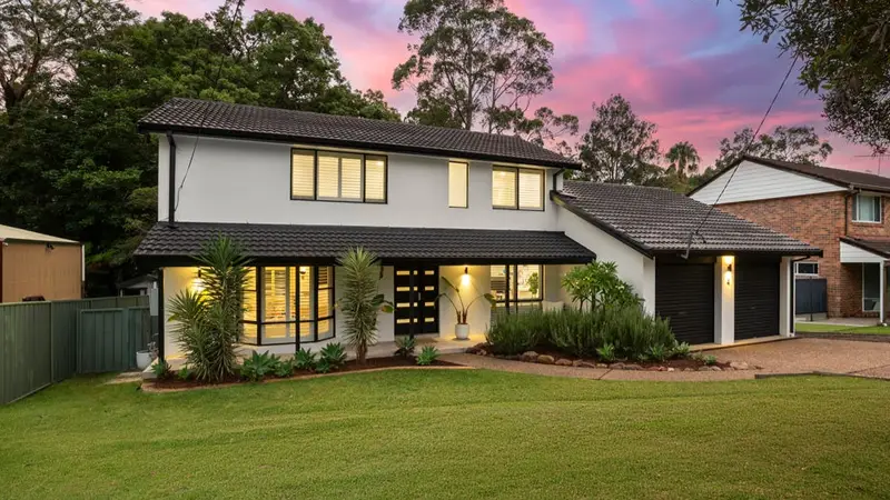 Home exterior painting near bushland